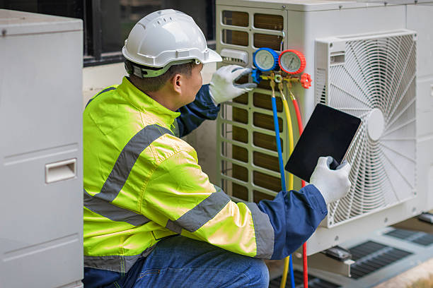 Professional Heat Pump Repair technician working in Elida, NM